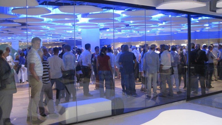 A well-lit office - multi-purpose sports and entertainment venue.