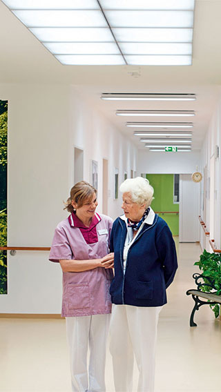 The corridor of Elderly Care Home illuminated by Philips Lighting